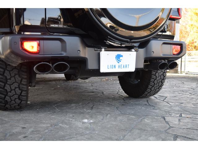 ジープ・ラングラーアンリミテッド サハラ　ブラックレザー　ジェプセン４本出しマフラー　スミティルーフラック　べストップサンライダー（ハードＴＯＰあり）　ルビコンホイール　ジオランダＸＡＴタイヤ　エルフォードフロントバンパー　ドラレコ（25枚目）