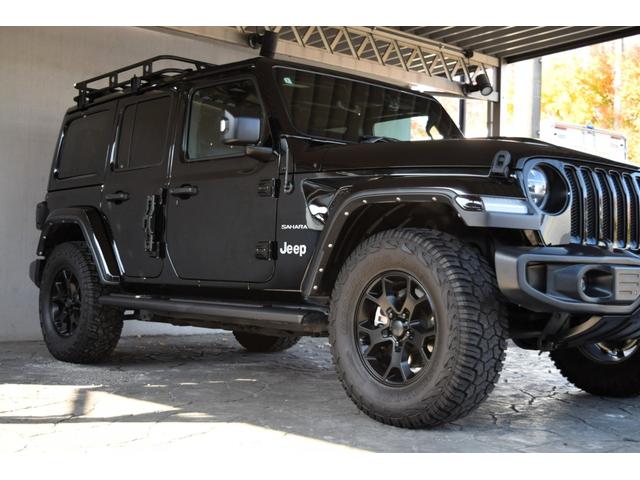 ジープ・ラングラーアンリミテッド サハラ　ブラックレザー　ジェプセン４本出しマフラー　スミティルーフラック　べストップサンライダー（ハードＴＯＰあり）　ルビコンホイール　ジオランダＸＡＴタイヤ　エルフォードフロントバンパー　ドラレコ（26枚目）