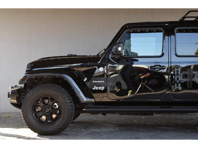 ジープ・ラングラーアンリミテッド サハラ　ブラックレザー　ジェプセン４本出しマフラー　スミティルーフラック　べストップサンライダー（ハードＴＯＰあり）　ルビコンホイール　ジオランダＸＡＴタイヤ　エルフォードフロントバンパー　ドラレコ（36枚目）