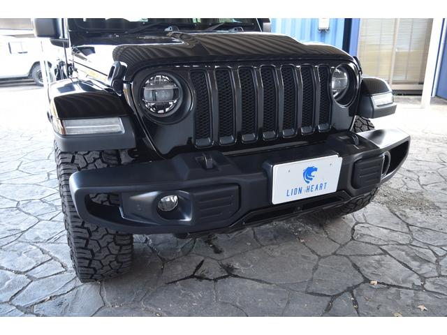 ジープ・ラングラーアンリミテッド サハラ　ブラックレザー　ジェプセン４本出しマフラー　スミティルーフラック　べストップサンライダー（ハードＴＯＰあり）　ルビコンホイール　ジオランダＸＡＴタイヤ　エルフォードフロントバンパー　ドラレコ（63枚目）