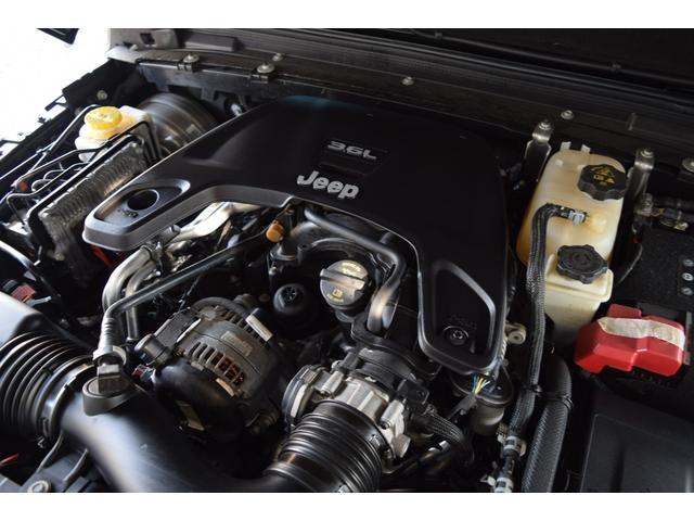 ジープ・ラングラーアンリミテッド サハラ　ブラックレザー　ジェプセン４本出しマフラー　スミティルーフラック　べストップサンライダー（ハードＴＯＰあり）　ルビコンホイール　ジオランダＸＡＴタイヤ　エルフォードフロントバンパー　ドラレコ（64枚目）