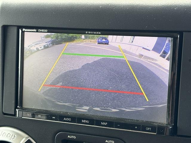 ジープ・ラングラーアンリミテッド サハラ　クルーズコントロール　ＡＬＰＩＮＥスピーカー　ステアリングスイッチ　サイドステップ　メモリーナビＴＶ　サイド・バックカメラ　純正１８インチアルミ　ＣＤ／ＤＶＤ再生　Ｂｌｕｅｔｏｏｔｈ接続　ＥＴＣ（5枚目）