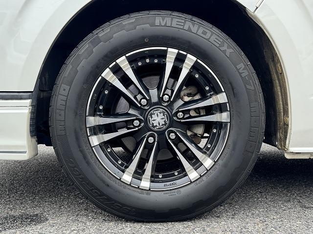 ハイエースバン スーパーGL ダークプライム ベットキット 社外フロントバンパー 社外テール 社外16インチアルミ フリップダウンモニター 社外ナビTV バックカメラ AC100V電源 両側スライドドア スマートキー ウッドコンビステアリング(29枚目)