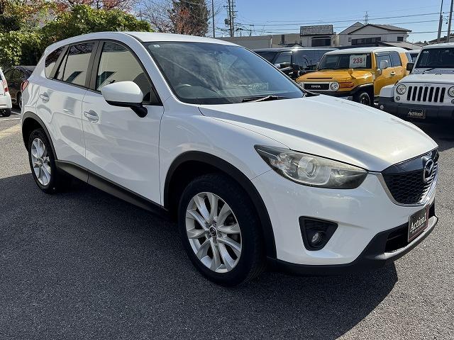 ＣＸ－５ ＸＤ　ＢＯＳＥサウンドスピーカー　社外ナビＴＶ　純正１９インチアルミホイール　サイド・バックカメラ　ＨＩＤヘッド　オートライト　ステアリングスイッチ　スマートキー　アイドリングストップ　オートライト　ＥＴＣ（22枚目）