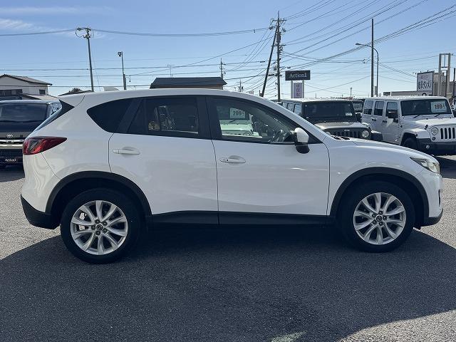 ＣＸ－５ ＸＤ　ＢＯＳＥサウンドスピーカー　社外ナビＴＶ　純正１９インチアルミホイール　サイド・バックカメラ　ＨＩＤヘッド　オートライト　ステアリングスイッチ　スマートキー　アイドリングストップ　オートライト　ＥＴＣ（23枚目）