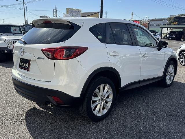 ＣＸ－５ ＸＤ　ＢＯＳＥサウンドスピーカー　社外ナビＴＶ　純正１９インチアルミホイール　サイド・バックカメラ　ＨＩＤヘッド　オートライト　ステアリングスイッチ　スマートキー　アイドリングストップ　オートライト　ＥＴＣ（24枚目）