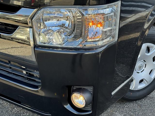 レジアスエースバン スーパーＧＬ　ダークプライム　両側電動スライドドア　ＡＣ１００Ｖ電源　ＬＥＤヘッド　ハーフレザーシート　スマートキー　プッシュスタート　社外テール　ステアリングスイッチ　Ｗエアバック　オートライト　革巻きウッドコンビステアリング（18枚目）