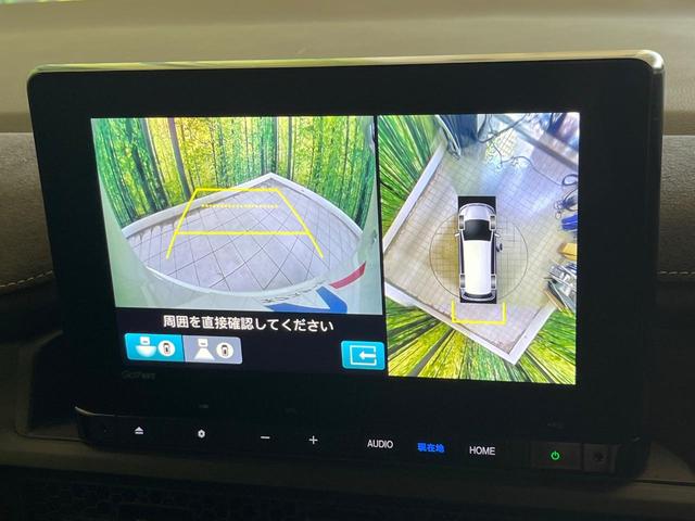 ステップワゴン ｅ：ＨＥＶスパーダ　プレミアムライン　禁煙車　純正９型ナビ　全周囲カメラ　衝突軽減　ＥＴＣ　Ｂｌｕｅｔｏｏｔｈ再生　両側電動スライドドア　パワーバックドア　ＢＳＭ　シートヒーター（前席中列）　オットマン　パドルシフト　シートバックテーブル（4枚目）