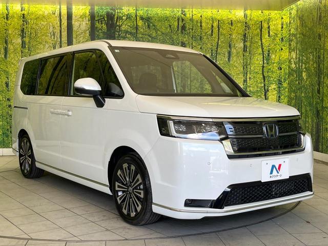 ステップワゴン ｅ：ＨＥＶスパーダ　プレミアムライン　禁煙車　純正９型ナビ　全周囲カメラ　衝突軽減　ＥＴＣ　Ｂｌｕｅｔｏｏｔｈ再生　両側電動スライドドア　パワーバックドア　ＢＳＭ　シートヒーター（前席中列）　オットマン　パドルシフト　シートバックテーブル（17枚目）