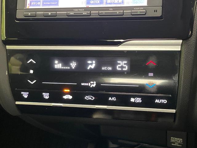 フィットハイブリッド Ｆパッケージ　コンフォートエディション　禁煙車　純正ＳＤナビ　バックカメラ　ＥＴＣ　シートヒーター　スマートキー　Ｂｌｕｔｏｏｔｈ接続　ＨＩＤヘッド　横滑り防止機能　オートエアコン　純正１５インチホイール　オートウィンドウ（31枚目）