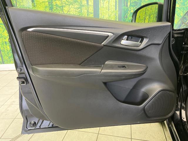 フィットハイブリッド Ｆパッケージ　コンフォートエディション　禁煙車　純正ＳＤナビ　バックカメラ　ＥＴＣ　シートヒーター　スマートキー　Ｂｌｕｔｏｏｔｈ接続　ＨＩＤヘッド　横滑り防止機能　オートエアコン　純正１５インチホイール　オートウィンドウ（37枚目）
