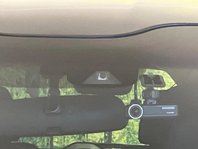 フリード G・ホンダセンシング 禁煙車 9型フローディングナビ フリップダウンモニター バックカメラ ETC フルセグTV スマートキー ホンダセンシング 両側電動スライドドア レーダークルーズ 純正15インチアルミ(6枚目)