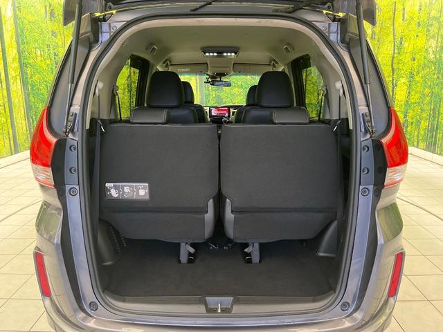フリード G・ホンダセンシング 禁煙車 9型フローディングナビ フリップダウンモニター バックカメラ ETC フルセグTV スマートキー ホンダセンシング 両側電動スライドドア レーダークルーズ 純正15インチアルミ(11枚目)