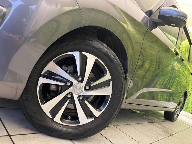 フリード G・ホンダセンシング 禁煙車 9型フローディングナビ フリップダウンモニター バックカメラ ETC フルセグTV スマートキー ホンダセンシング 両側電動スライドドア レーダークルーズ 純正15インチアルミ(14枚目)