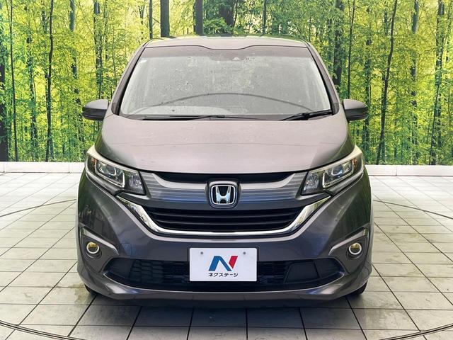 フリード G・ホンダセンシング 禁煙車 9型フローディングナビ フリップダウンモニター バックカメラ ETC フルセグTV スマートキー ホンダセンシング 両側電動スライドドア レーダークルーズ 純正15インチアルミ(15枚目)