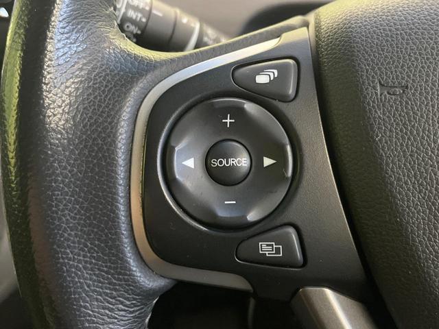 フリード G・ホンダセンシング 禁煙車 9型フローディングナビ フリップダウンモニター バックカメラ ETC フルセグTV スマートキー ホンダセンシング 両側電動スライドドア レーダークルーズ 純正15インチアルミ(28枚目)