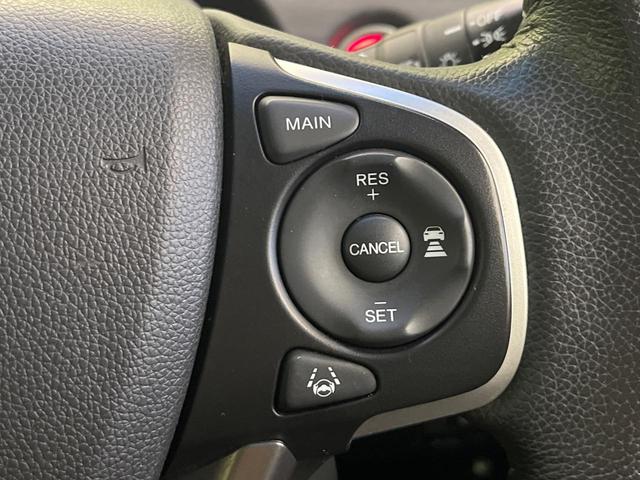 フリード G・ホンダセンシング 禁煙車 9型フローディングナビ フリップダウンモニター バックカメラ ETC フルセグTV スマートキー ホンダセンシング 両側電動スライドドア レーダークルーズ 純正15インチアルミ(29枚目)