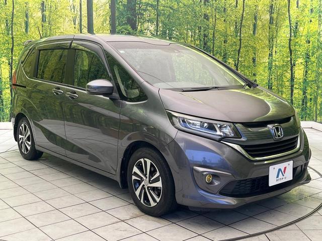 フリード G・ホンダセンシング 禁煙車 9型フローディングナビ フリップダウンモニター バックカメラ ETC フルセグTV スマートキー ホンダセンシング 両側電動スライドドア レーダークルーズ 純正15インチアルミ(56枚目)