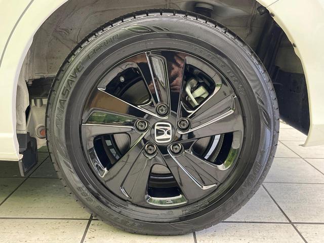 フリードハイブリッド ハイブリッド・Ｇブラックスタイル　禁煙車　ＳＤナビ　バックカメラ　ドラレコ　ＥＴＣ　Ｂｌｕｅｔｏｏｔｈ再生　シートヒーター（前席）　両側電動スライドドア　アダプティブクルーズ　ホンダセンシング　ＬＥＤヘッドライト　純正１５インチアルミ（14枚目）