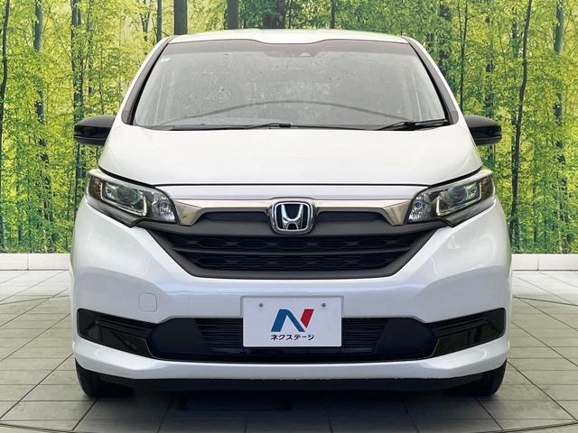 フリードハイブリッド ハイブリッド・Ｇブラックスタイル　禁煙車　ＳＤナビ　バックカメラ　ドラレコ　ＥＴＣ　Ｂｌｕｅｔｏｏｔｈ再生　シートヒーター（前席）　両側電動スライドドア　アダプティブクルーズ　ホンダセンシング　ＬＥＤヘッドライト　純正１５インチアルミ（15枚目）