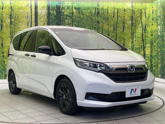 フリードハイブリッド ハイブリッド・Ｇブラックスタイル　禁煙車　ＳＤナビ　バックカメラ　ドラレコ　ＥＴＣ　Ｂｌｕｅｔｏｏｔｈ再生　シートヒーター（前席）　両側電動スライドドア　アダプティブクルーズ　ホンダセンシング　ＬＥＤヘッドライト　純正１５インチアルミ（17枚目）