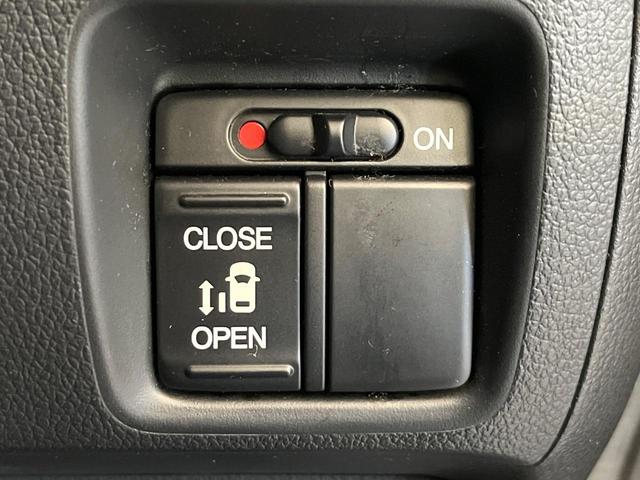 N-BOX+カスタム G・Lパッケージ 禁煙車 純正ナビ バックカメラ パワスラ HIDヘッドライト ETC オートライト オートエアコン 純正14インチアルミ CD DVD再生(5枚目)