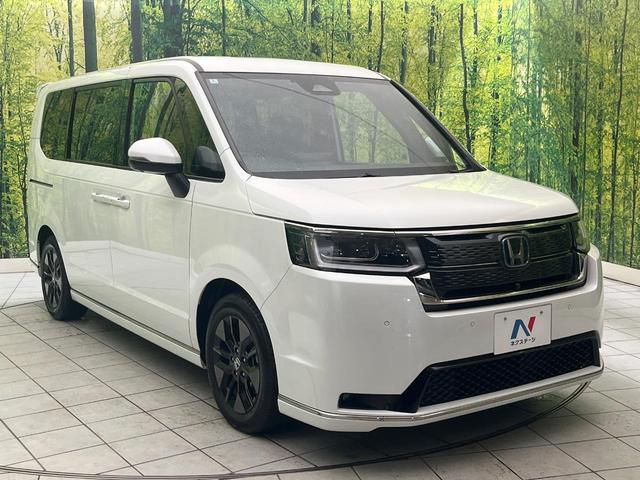 ステップワゴン e:HEVスパーダ 禁煙車 純正11.4型ナビ 全周囲カメラ 両側電動ドア 後席モニター 衝突被害軽減システム レーダークルーズ ハーフレザーシート コーナーセンサー スマートキー LEDヘッド ETC(17枚目)
