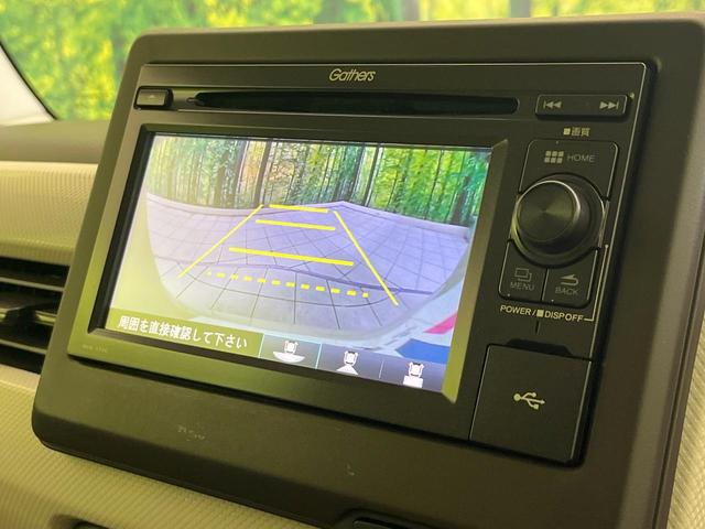 N-BOX G・Lターボホンダセンシング 禁煙車 純正ディスプレイオーディオ バックカメラ ドラレコ ETC 両側電動スライドドア シートヒーター(前席) パドルシフト ステアリングスイッチ 車線逸脱警報 アダプティブクルーズ 横滑り防止装置(3枚目)