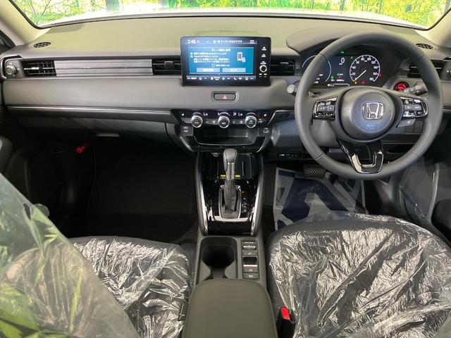 ヴェゼル e:HEV Z 登録済未使用車 純正9型ナビ 全周囲カメラ 衝突被害軽減システム フルセグTV レーダークルーズ ハーフレザーシート スマートキー LEDヘッド ETC2.0 オートハイビーム 車線逸脱警報(2枚目)