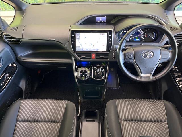 ヴォクシー ハイブリッドＺＳ　煌　禁煙車　後席モニター　純正１０型ナビ　バックカメラ　ドラレコ　ＥＴＣ　Ｂｌｕｅｔｏｏｔｈ再生　両側電動スライドドア　シートヒーター（前席）　クルコン　セーフティセンス　フルセグＴＶ　リアオートエアコン（2枚目）
