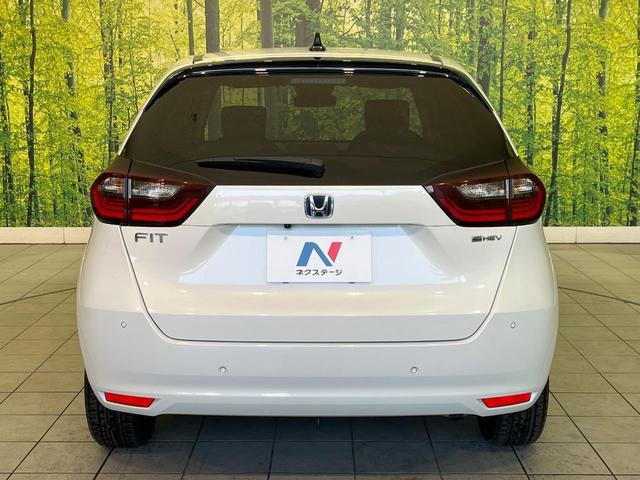 フィット ｅ：ＨＥＶベーシック　禁煙車　純正９型ナビ　バックカメラ　衝突被害軽減システム　レーダークルーズ　コーナーセンサー　スマートキー　ＬＥＤヘッド　ビルトインＥＴＣ　オートハイビーム　車線逸脱警報　オートライト　オートエアコン（15枚目）