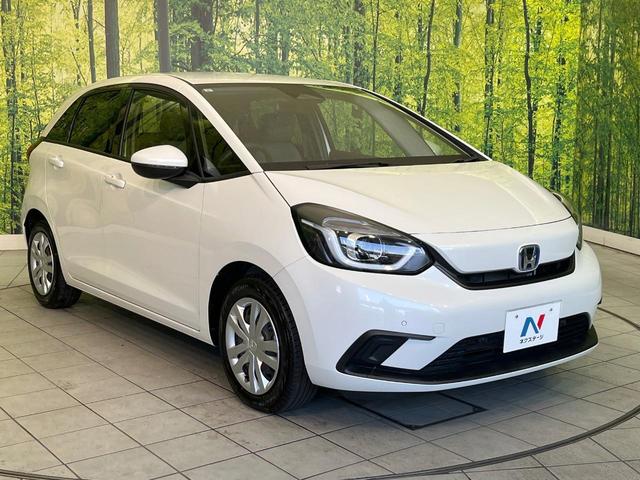 フィット ｅ：ＨＥＶベーシック　禁煙車　純正９型ナビ　バックカメラ　衝突被害軽減システム　レーダークルーズ　コーナーセンサー　スマートキー　ＬＥＤヘッド　ビルトインＥＴＣ　オートハイビーム　車線逸脱警報　オートライト　オートエアコン（16枚目）