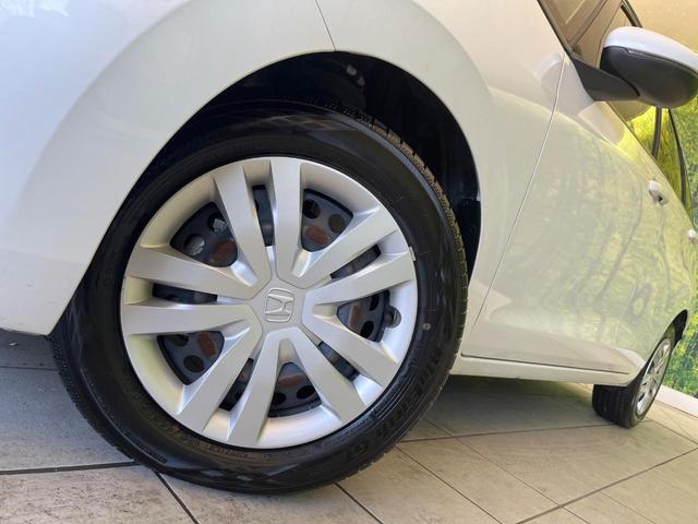 フィット ｅ：ＨＥＶベーシック　禁煙車　純正９型ナビ　バックカメラ　衝突被害軽減システム　レーダークルーズ　コーナーセンサー　スマートキー　ＬＥＤヘッド　ビルトインＥＴＣ　オートハイビーム　車線逸脱警報　オートライト　オートエアコン（21枚目）