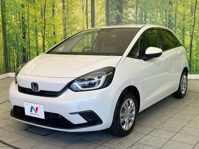 フィット ｅ：ＨＥＶベーシック　禁煙車　純正９型ナビ　バックカメラ　衝突被害軽減システム　レーダークルーズ　コーナーセンサー　スマートキー　ＬＥＤヘッド　ビルトインＥＴＣ　オートハイビーム　車線逸脱警報　オートライト　オートエアコン（26枚目）