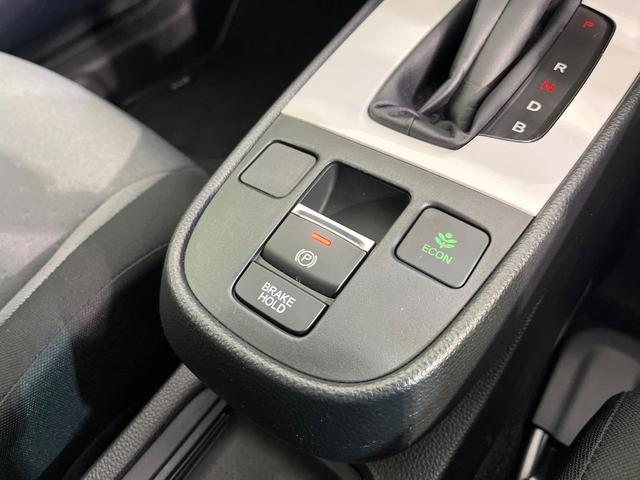 フィット ｅ：ＨＥＶベーシック　禁煙車　純正９型ナビ　バックカメラ　衝突被害軽減システム　レーダークルーズ　コーナーセンサー　スマートキー　ＬＥＤヘッド　ビルトインＥＴＣ　オートハイビーム　車線逸脱警報　オートライト　オートエアコン（48枚目）