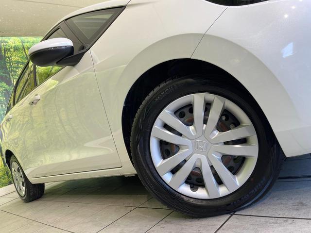 フィット ｅ：ＨＥＶベーシック　禁煙車　純正９型ナビ　バックカメラ　衝突被害軽減システム　レーダークルーズ　コーナーセンサー　スマートキー　ＬＥＤヘッド　ビルトインＥＴＣ　オートハイビーム　車線逸脱警報　オートライト　オートエアコン（53枚目）