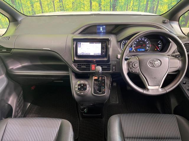 ヴォクシー ＺＳ　煌　禁煙車　純正ナビ　バックカメラ　ＥＴＣ　ドラレコ　両側パワースライドドア　衝突被害軽減ブレーキ　車線逸脱抑制装置　スマートキー　純正１６インチアルミ　デュアルエアコン　アイドリングストップ（2枚目）