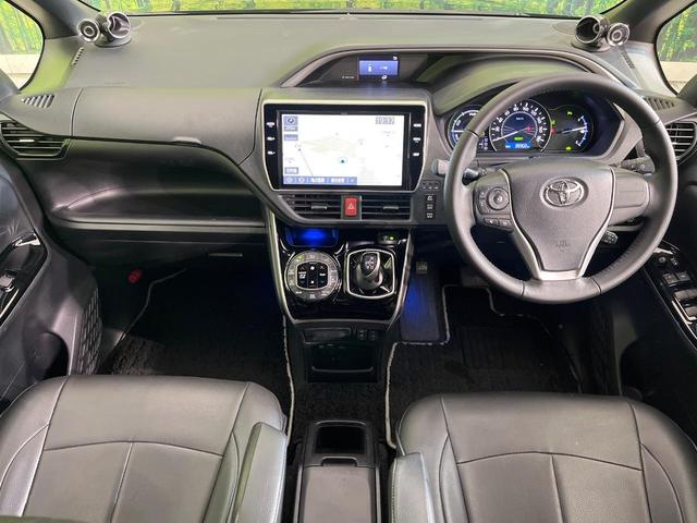 ヴォクシー ハイブリッドＺＳ　煌ＩＩＩ　禁煙車　フリップダウンモニター　モデリスタフルエアロ　モデリスタマフラー　純正１０型ナビ　バックカメラ　ＥＴＣ　ドラレコ　クルコン　スマートキー　両側パワスラ　シートヒーター　スマートキー（2枚目）