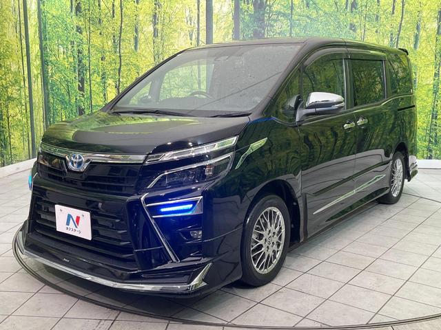 ヴォクシー ハイブリッドＺＳ　煌ＩＩＩ　禁煙車　フリップダウンモニター　モデリスタフルエアロ　モデリスタマフラー　純正１０型ナビ　バックカメラ　ＥＴＣ　ドラレコ　クルコン　スマートキー　両側パワスラ　シートヒーター　スマートキー（4枚目）