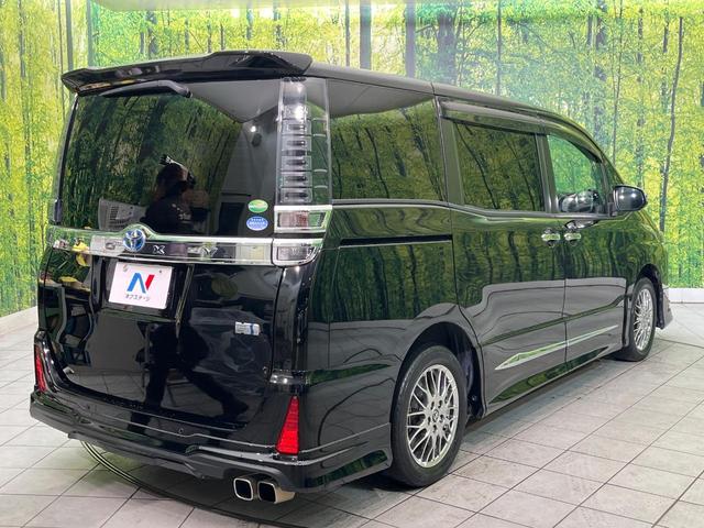 ヴォクシー ハイブリッドＺＳ　煌ＩＩＩ　禁煙車　フリップダウンモニター　モデリスタフルエアロ　モデリスタマフラー　純正１０型ナビ　バックカメラ　ＥＴＣ　ドラレコ　クルコン　スマートキー　両側パワスラ　シートヒーター　スマートキー（18枚目）