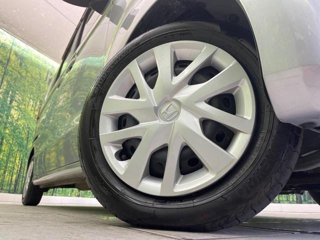 N-BOX G 禁煙車 SDナビ ETC ドラレコ Bluetooth再生 ホンダセンシング アダプティブクルーズ コーナーセンサー 車線逸脱警報 横滑り防止装置 ステアリングスイッチ スマートキー オートエアコン(57枚目)