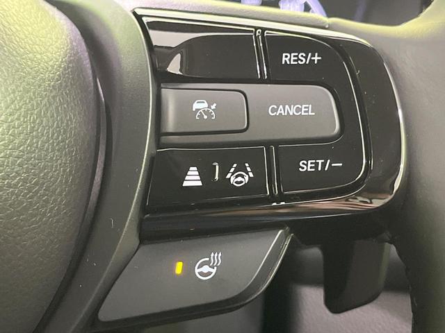 ヴェゼル ｅ：ＨＥＶ　Ｚ　登録済未使用車　純正９型ナビ　全周囲カメラ　ＥＴＣ２．０　Ｂｌｕｅｔｏｏｔｈ再生　ＢＳＭ　フルセグＴＶ　シートヒーター（前席）　パドルシフト　パワーバックドア　ハーフレザーシート　ステアリングヒーター（8枚目）