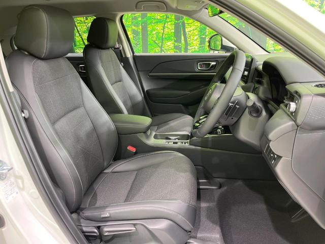 ヴェゼル ｅ：ＨＥＶ　Ｚ　登録済未使用車　純正９型ナビ　全周囲カメラ　ＥＴＣ２．０　Ｂｌｕｅｔｏｏｔｈ再生　ＢＳＭ　フルセグＴＶ　シートヒーター（前席）　パドルシフト　パワーバックドア　ハーフレザーシート　ステアリングヒーター（9枚目）