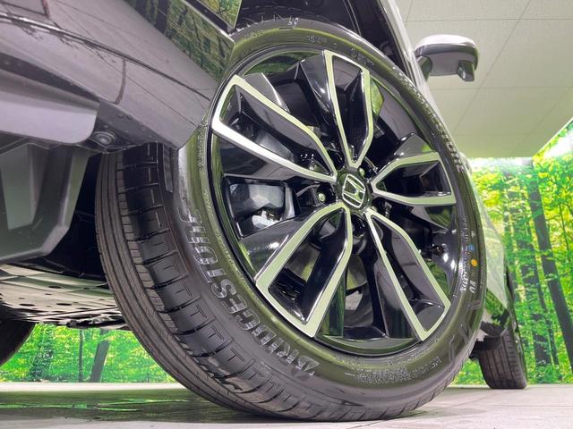 ヴェゼル ｅ：ＨＥＶ　Ｚ　登録済未使用車　純正９型ナビ　全周囲カメラ　ＥＴＣ２．０　Ｂｌｕｅｔｏｏｔｈ再生　ＢＳＭ　フルセグＴＶ　シートヒーター（前席）　パドルシフト　パワーバックドア　ハーフレザーシート　ステアリングヒーター（14枚目）