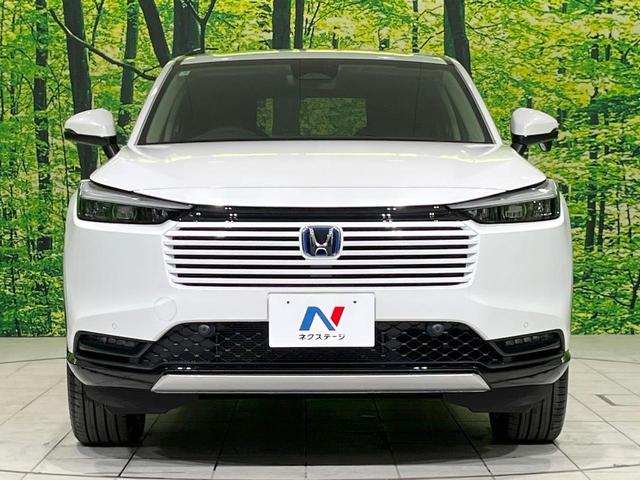 ヴェゼル ｅ：ＨＥＶ　Ｚ　登録済未使用車　純正９型ナビ　全周囲カメラ　ＥＴＣ２．０　Ｂｌｕｅｔｏｏｔｈ再生　ＢＳＭ　フルセグＴＶ　シートヒーター（前席）　パドルシフト　パワーバックドア　ハーフレザーシート　ステアリングヒーター（15枚目）