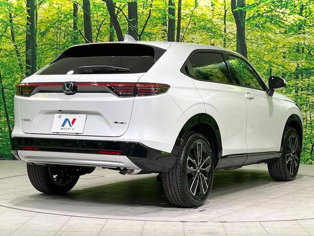 ヴェゼル ｅ：ＨＥＶ　Ｚ　登録済未使用車　純正９型ナビ　全周囲カメラ　ＥＴＣ２．０　Ｂｌｕｅｔｏｏｔｈ再生　ＢＳＭ　フルセグＴＶ　シートヒーター（前席）　パドルシフト　パワーバックドア　ハーフレザーシート　ステアリングヒーター（18枚目）