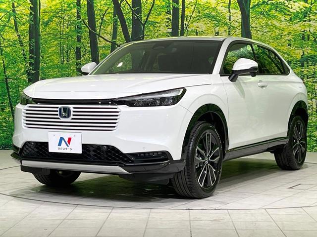 ヴェゼル ｅ：ＨＥＶ　Ｚ　登録済未使用車　純正９型ナビ　全周囲カメラ　ＥＴＣ２．０　Ｂｌｕｅｔｏｏｔｈ再生　ＢＳＭ　フルセグＴＶ　シートヒーター（前席）　パドルシフト　パワーバックドア　ハーフレザーシート　ステアリングヒーター（28枚目）