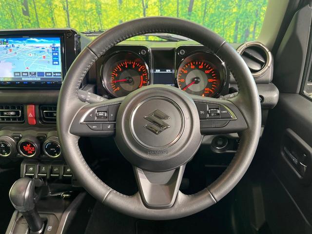 ジムニー ＸＣ　禁煙車　純正８型ナビ　バックカメラ　ＥＴＣ　Ｂｌｕｅｔｏｏｔｈ再生　シートヒーター（前席）　クルコン　コーナーセンサー　セーフティサポート　アイドリングストップ　スマートキー　オートエアコン（11枚目）