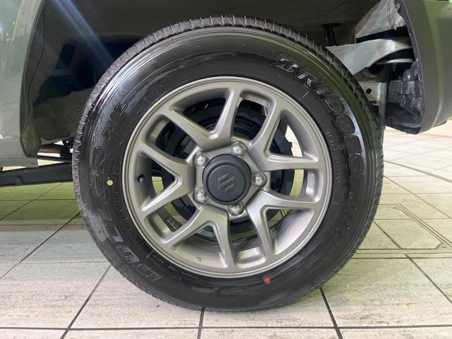 ジムニー ＸＣ　禁煙車　純正８型ナビ　バックカメラ　ＥＴＣ　Ｂｌｕｅｔｏｏｔｈ再生　シートヒーター（前席）　クルコン　コーナーセンサー　セーフティサポート　アイドリングストップ　スマートキー　オートエアコン（13枚目）