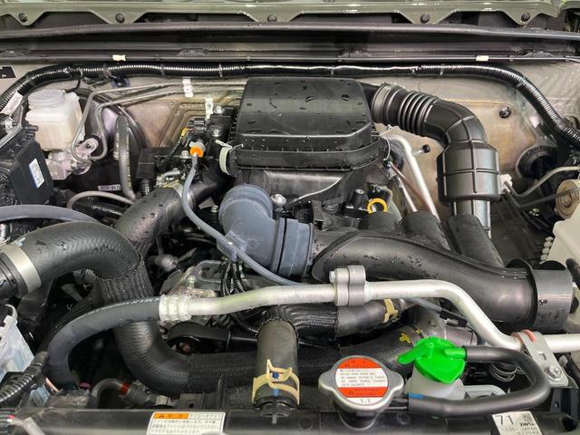 ジムニー ＸＣ　禁煙車　純正８型ナビ　バックカメラ　ＥＴＣ　Ｂｌｕｅｔｏｏｔｈ再生　シートヒーター（前席）　クルコン　コーナーセンサー　セーフティサポート　アイドリングストップ　スマートキー　オートエアコン（18枚目）